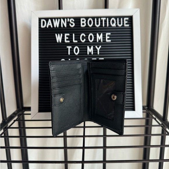 Black Michael Kors Wallet. L 5 1/4” W 1 1/2” H 4” - Picture 3 of 5